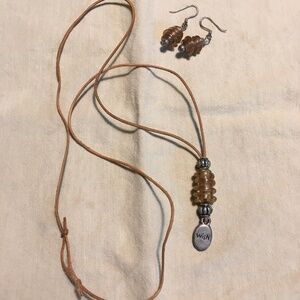 Handmade necklace and matching earrings made of glass beads